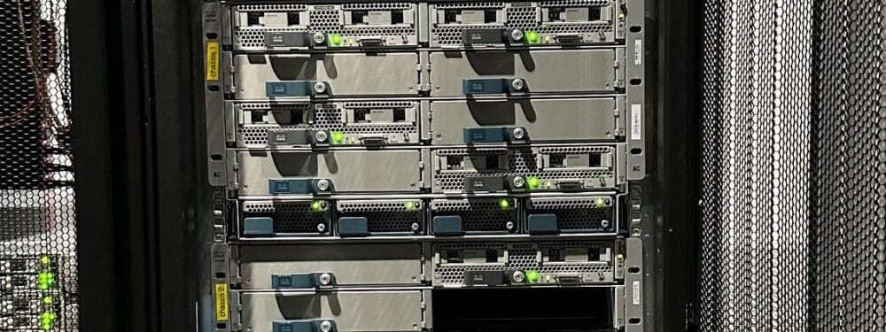 A row of servers in a data center, neatly organized with blinking lights and cables, ready to process and store data efficiently