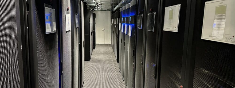 Rows of servers in a data center hallway