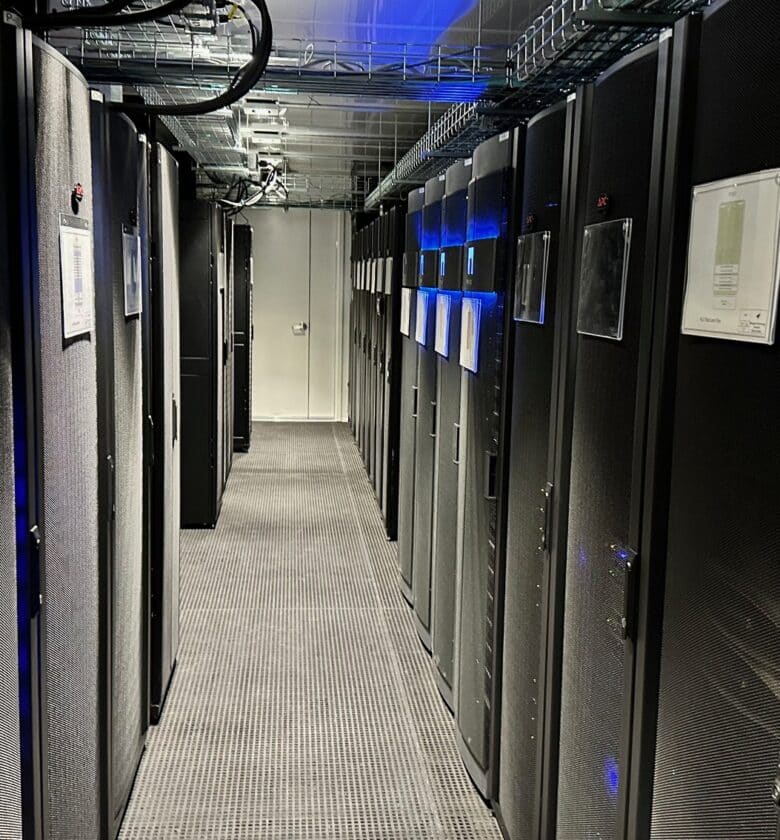 Rows of servers in a data center hallway