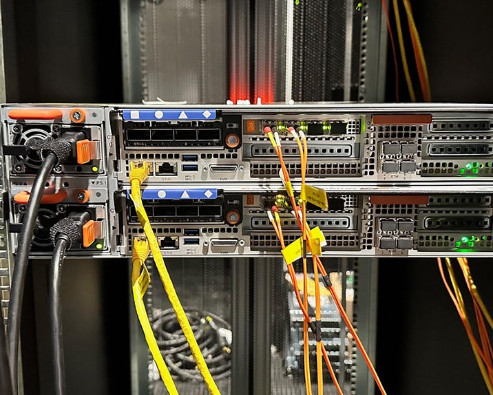 An organized server rack with various cables